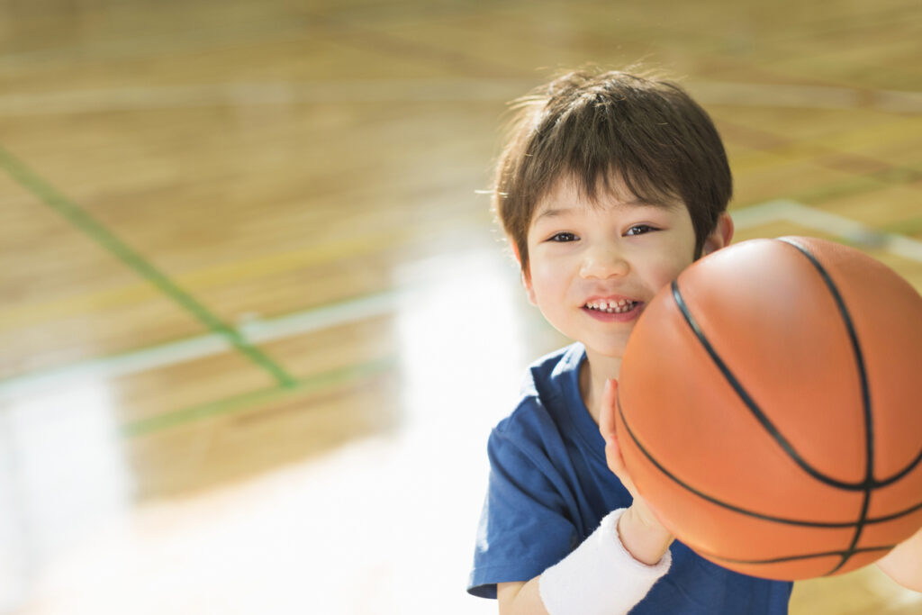 Boy holding basketball